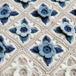 Willow Blossom Crochet Cot Blanket Pattern by Janie Crow